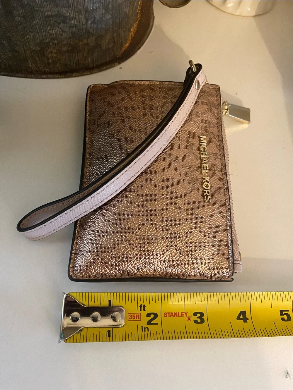 Michael Kors Metallic Rose Gold and Blush Wristlet w/ gold Hardware